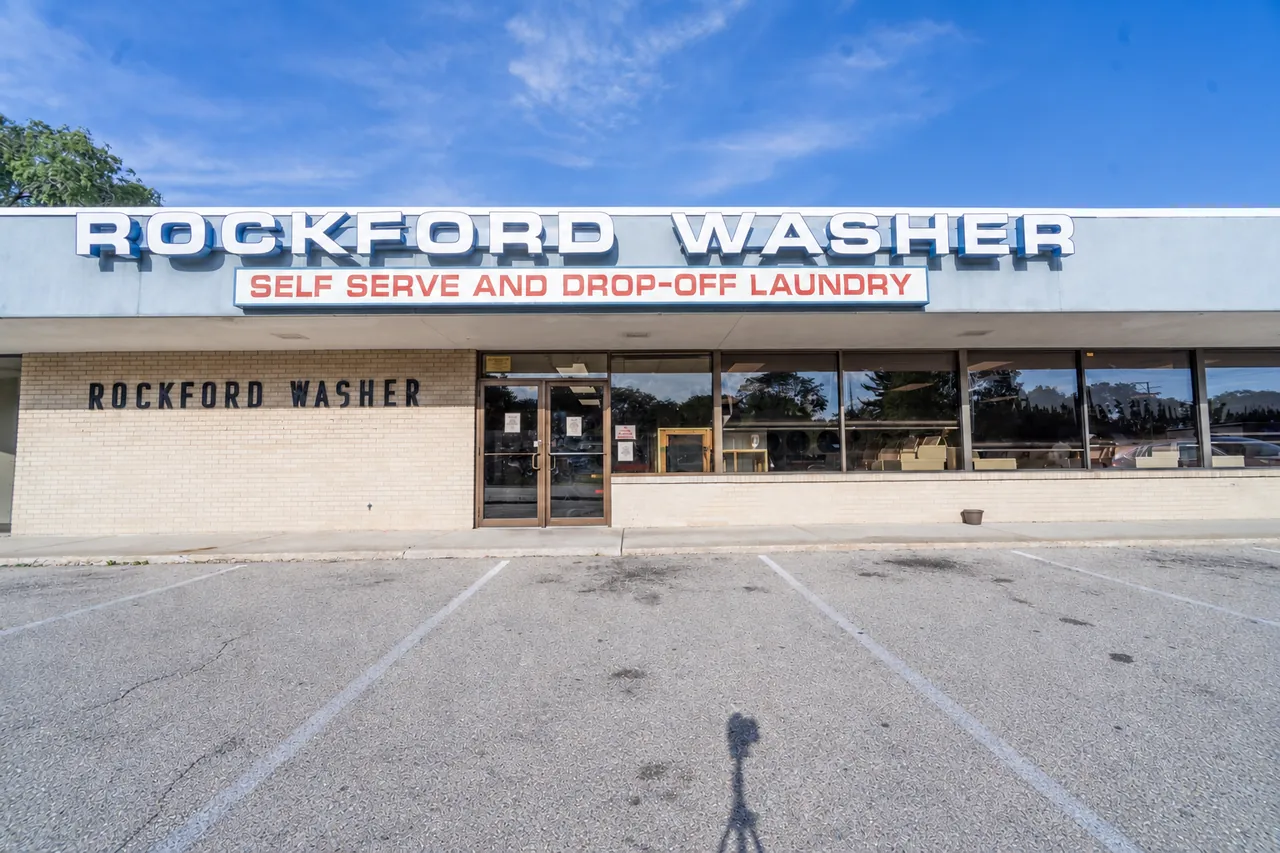 Front exterior of Rockford Washer with its vintage sign